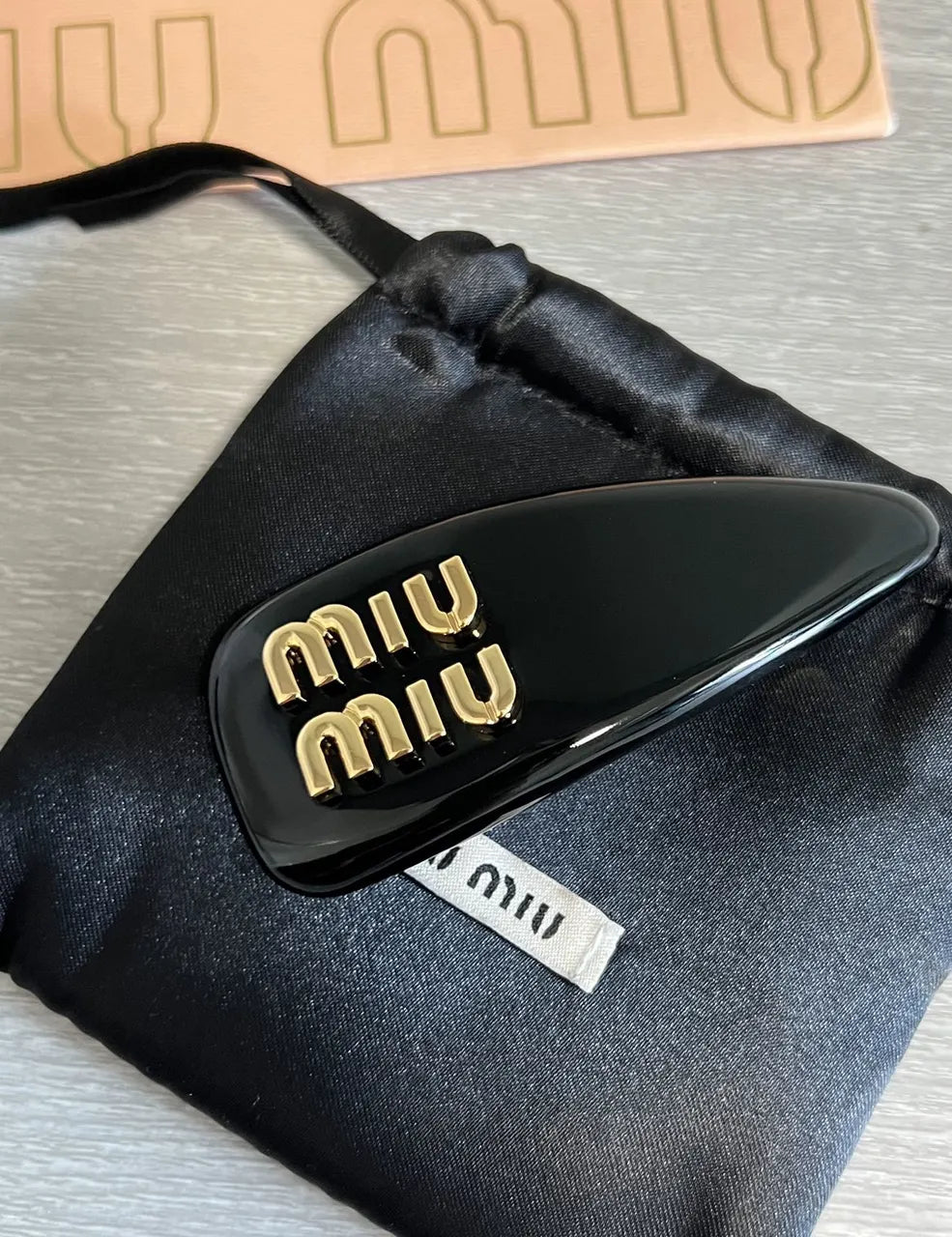 gold logo Miu Miu Black Resin Hair Clip