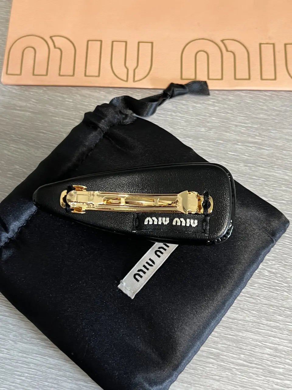 gold logo Miu Miu Black Resin Hair Clip - Hình 2