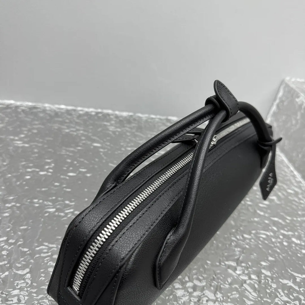 sleek Alaïa Black Leather Cylinder Bag - Hình 2