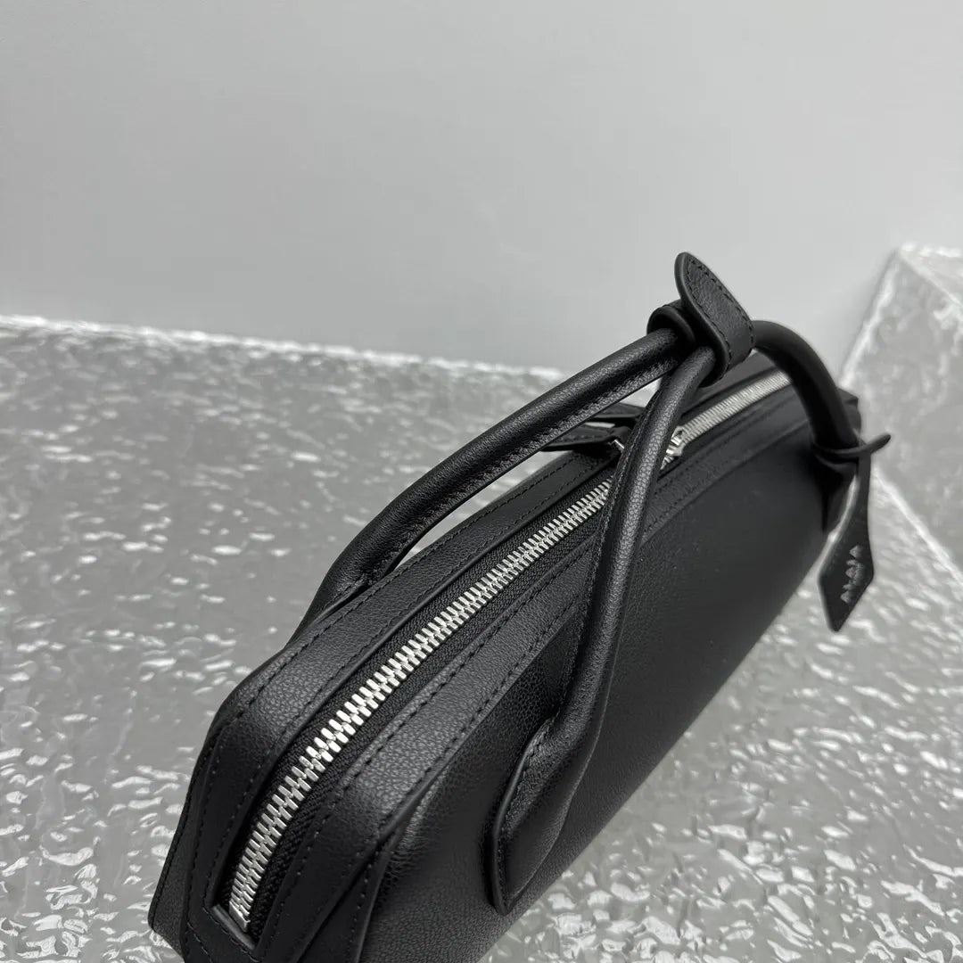 sleek Alaïa Black Leather Cylinder Bag - Hình 2