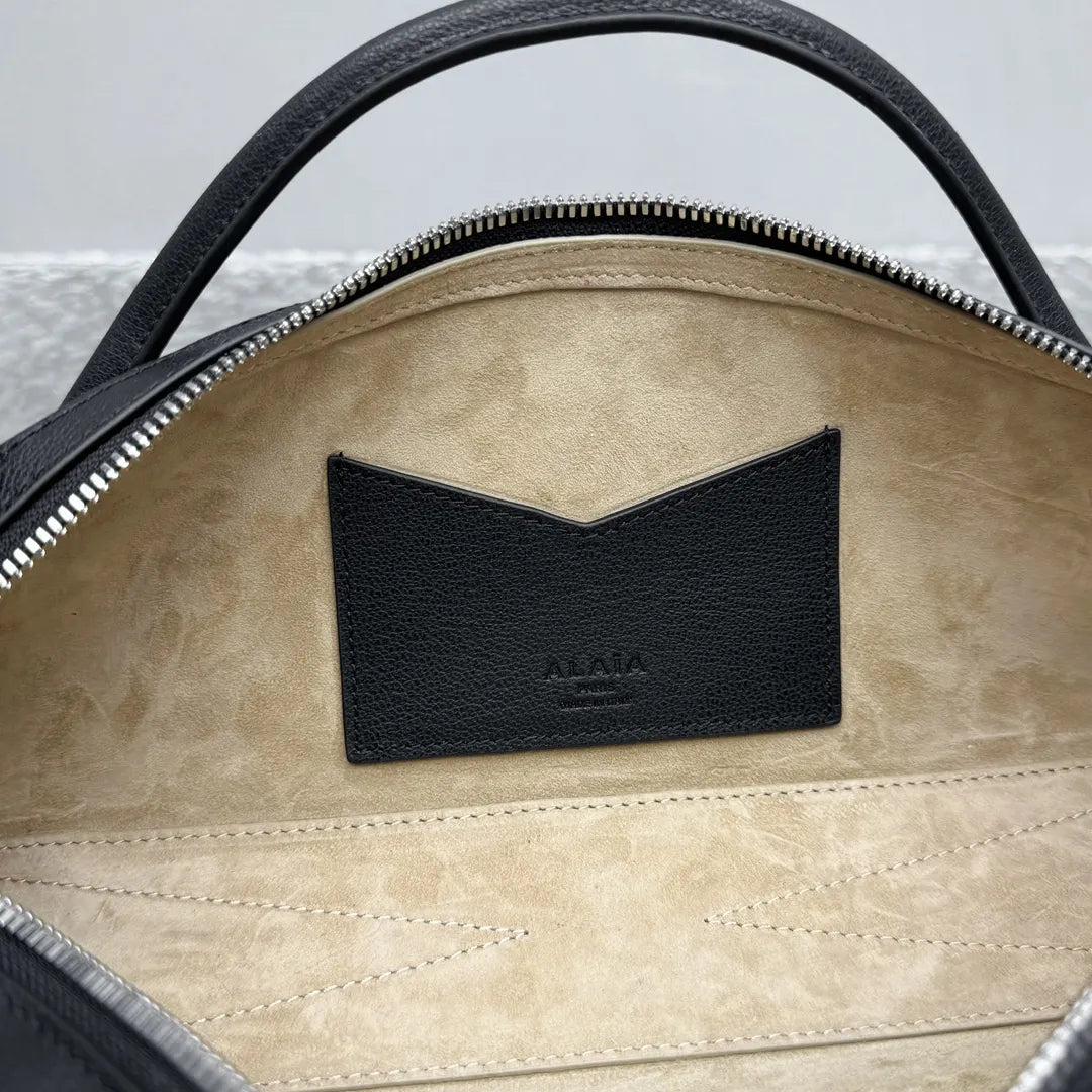 sleek Alaïa Black Leather Cylinder Bag - Hình 14
