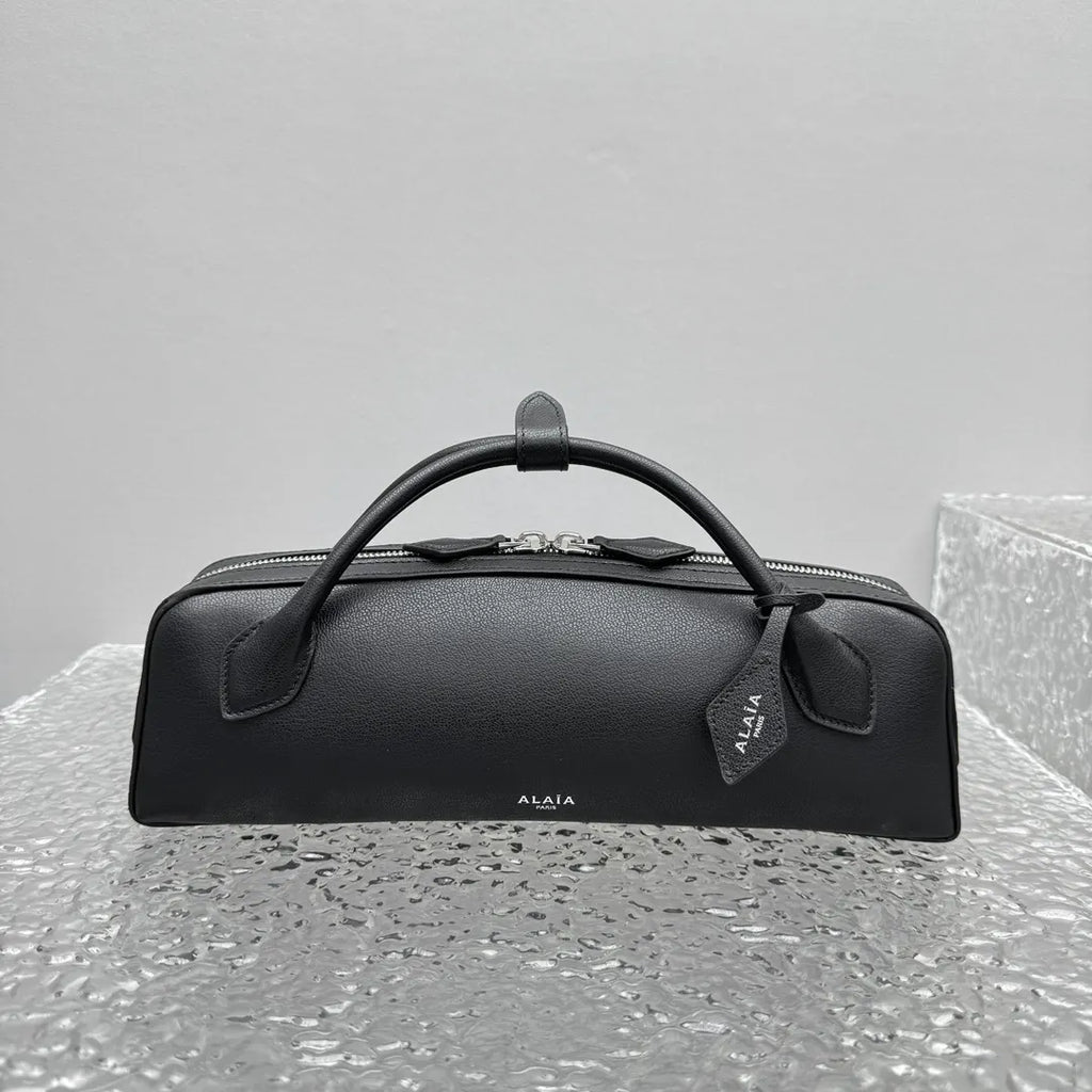 sleek Alaïa Black Leather Cylinder Bag - Hình 7
