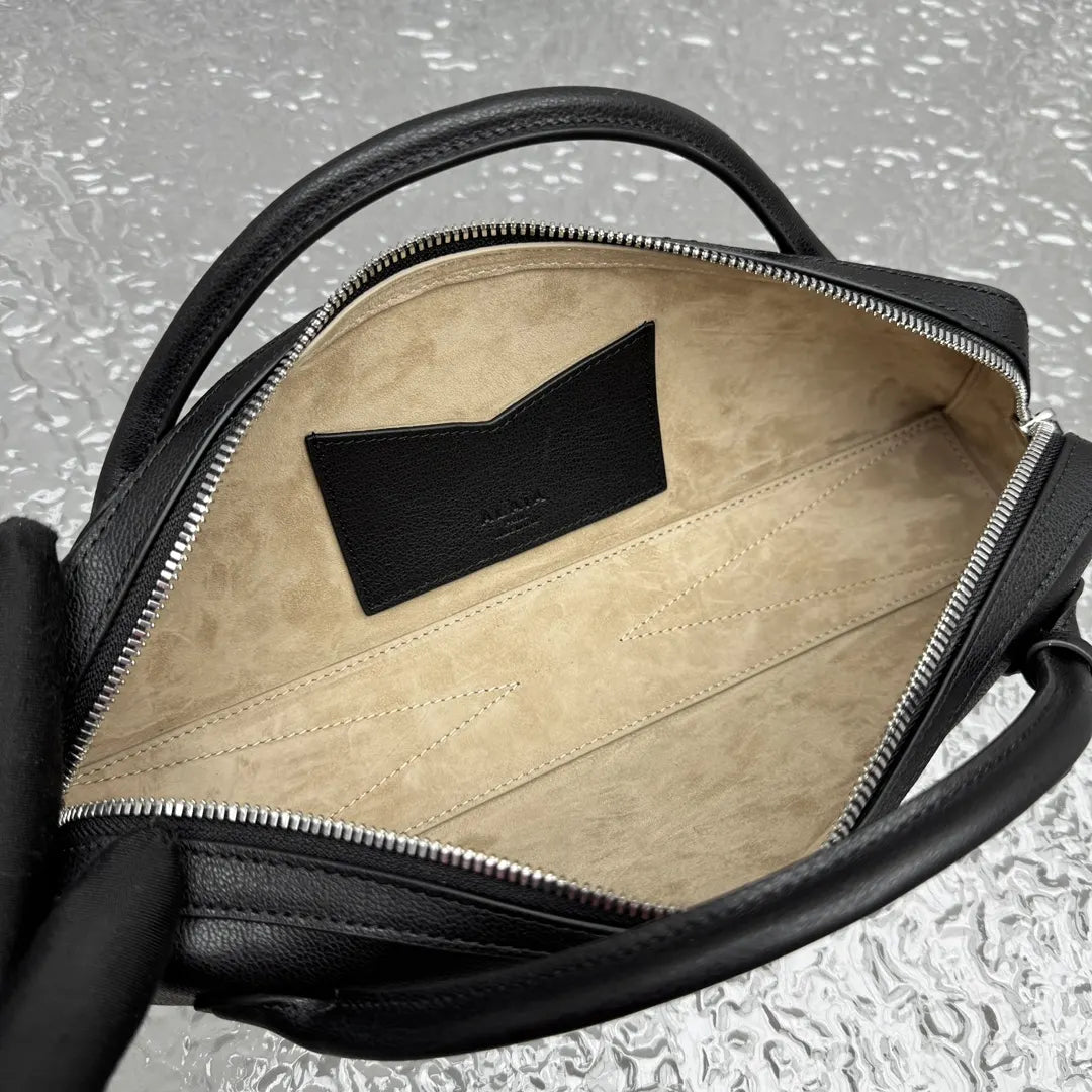sleek Alaïa Black Leather Cylinder Bag - Hình 13