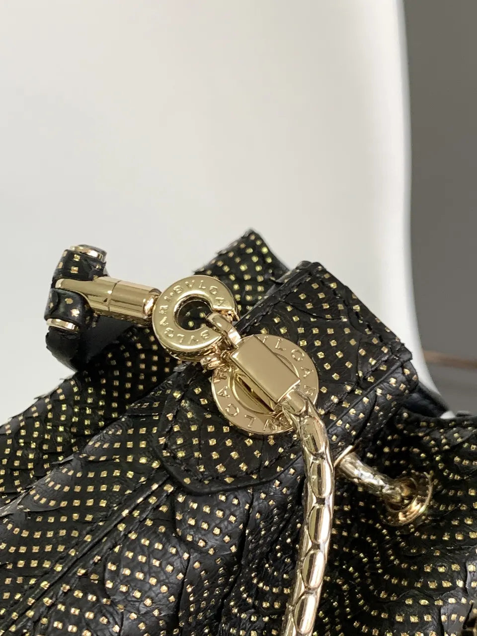 black Bvlgari Gold Studded Bucket Bag - Hình 7