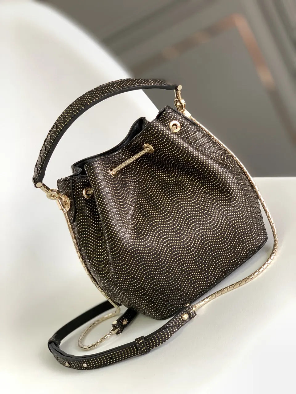 black Bvlgari Gold Studded Bucket Bag - Hình 3