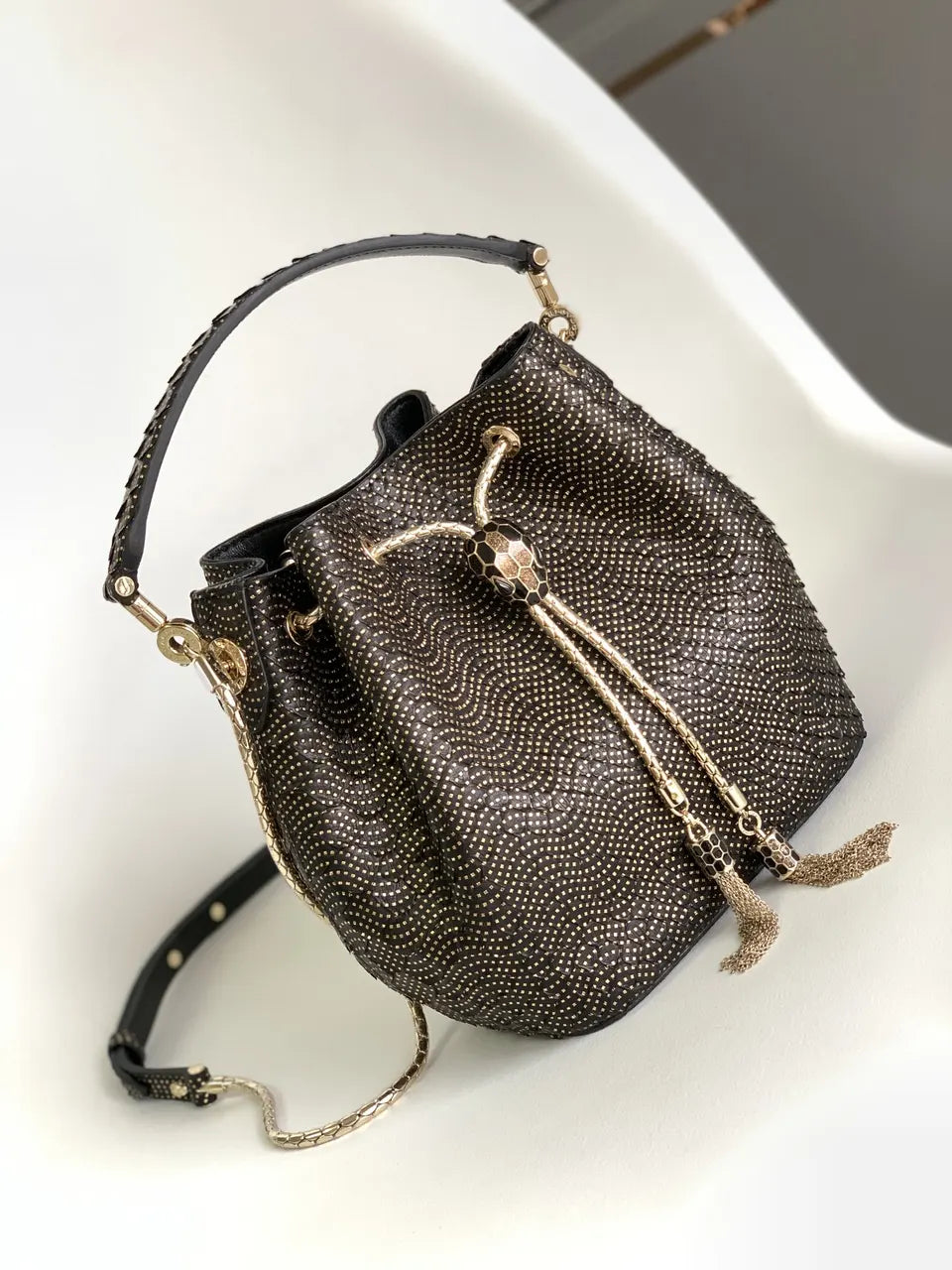 black Bvlgari Gold Studded Bucket Bag