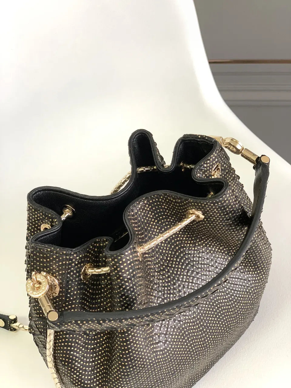 black Bvlgari Gold Studded Bucket Bag - Hình 6