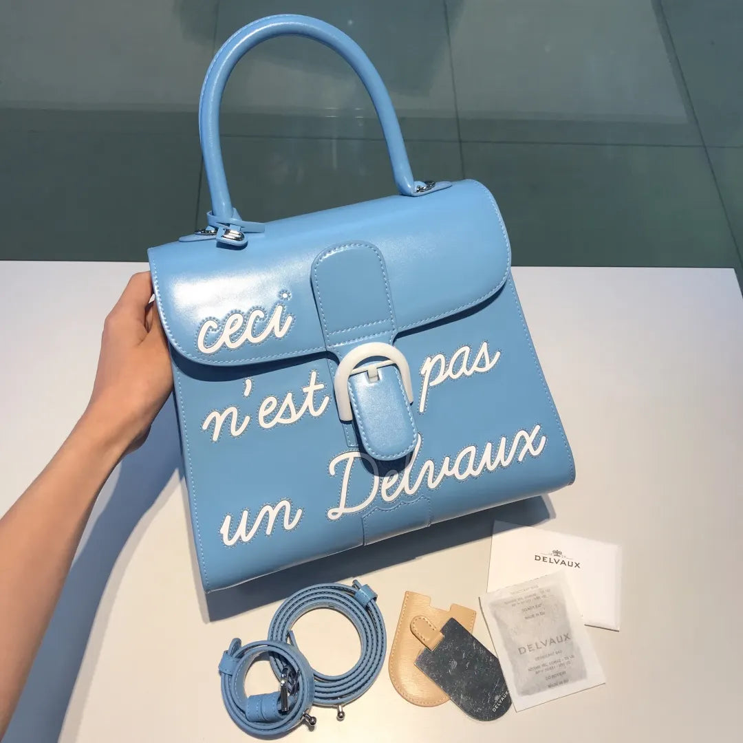 Delvaux Sky Blue Ceci N'Est Pas