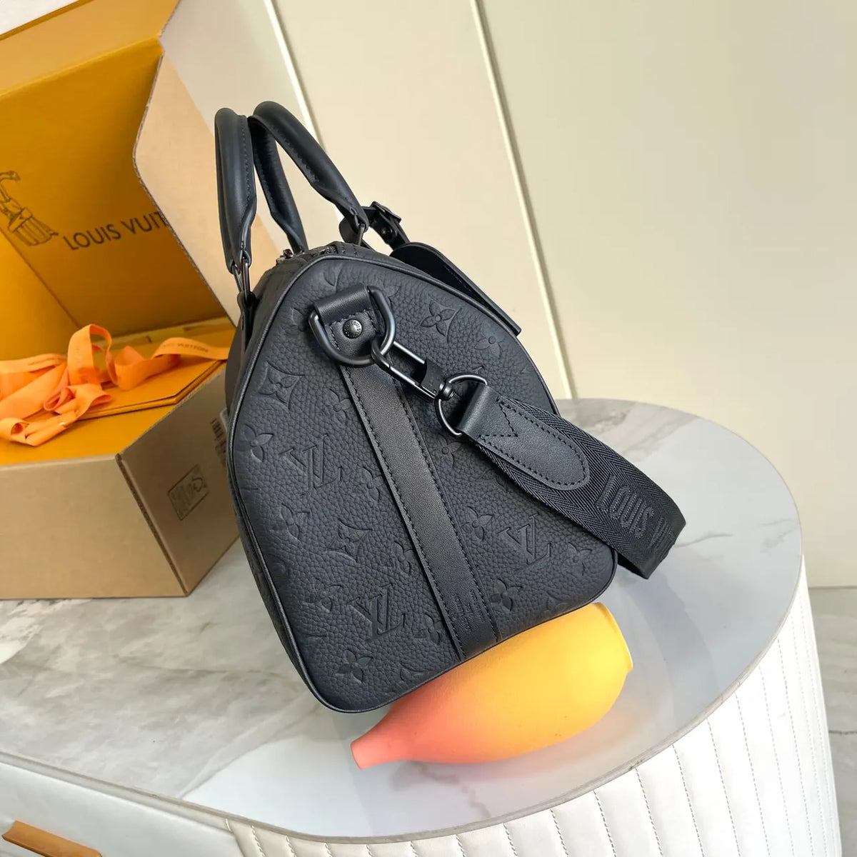 Louis Vuitton Black Embossed Leather Duffle - Hình 2