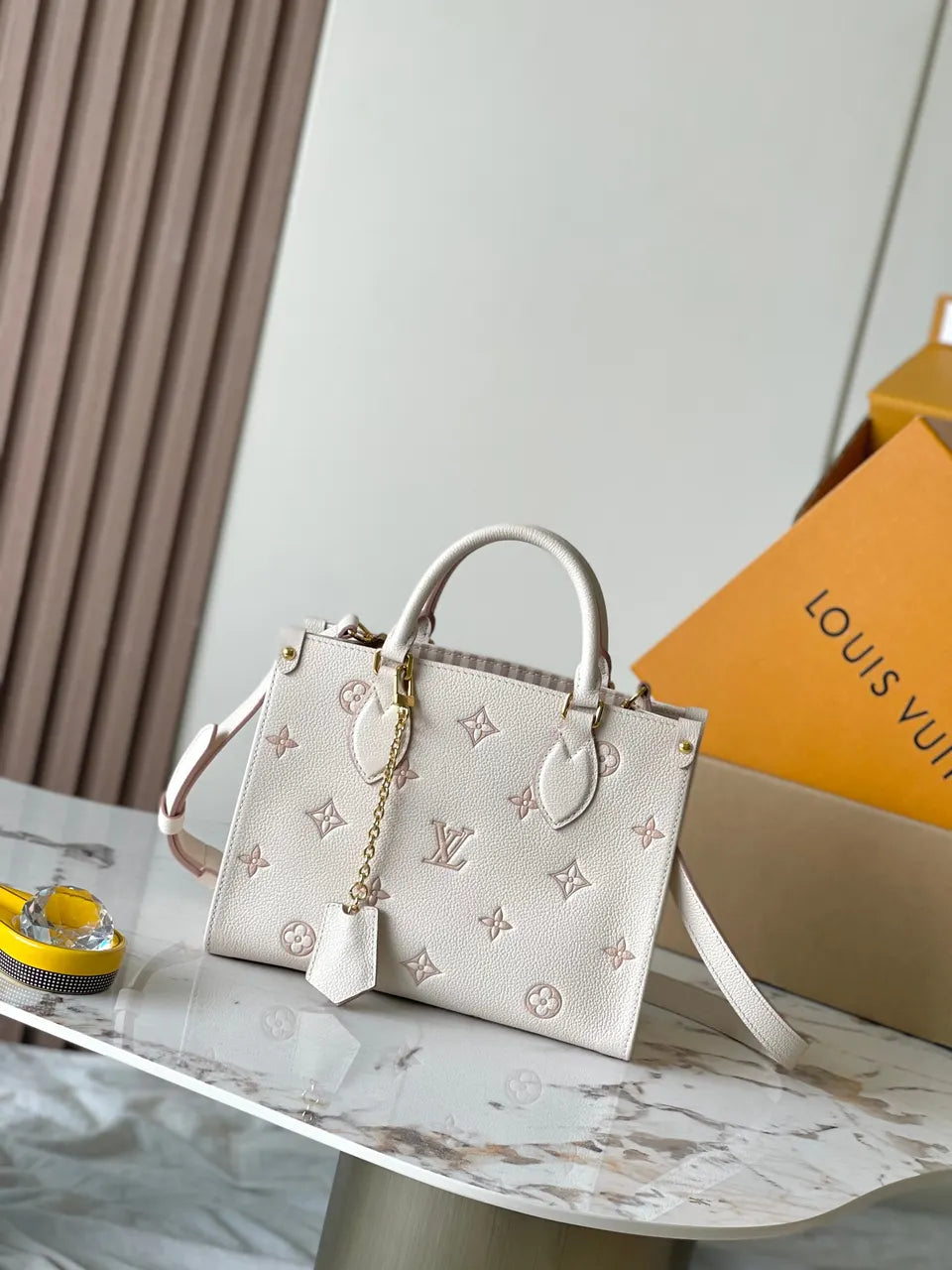 LV Cream Empreinte Pink Bag