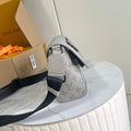 embossed Louis Vuitton Gray Crossbody