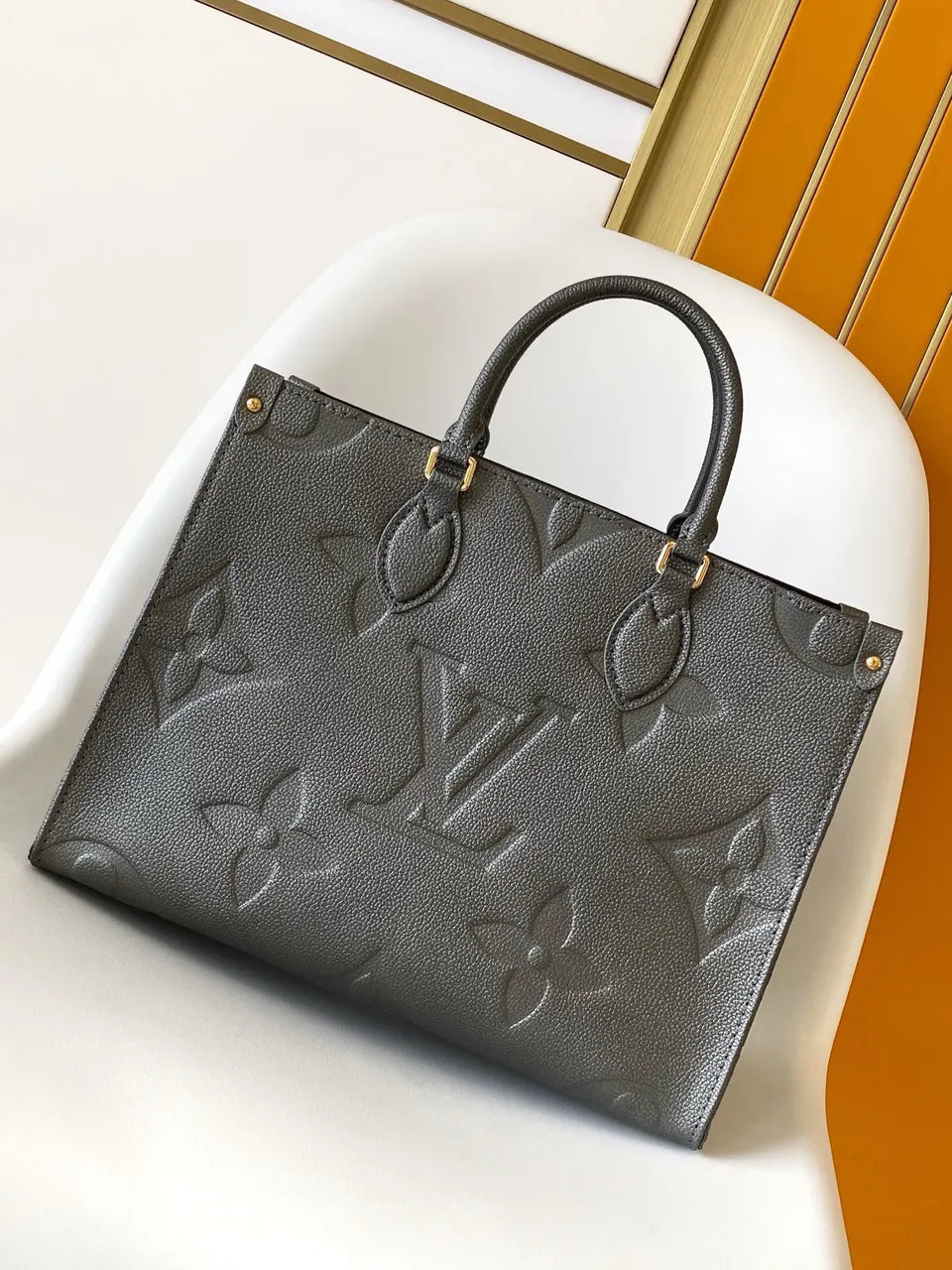 Louis Vuitton Gray Embossed